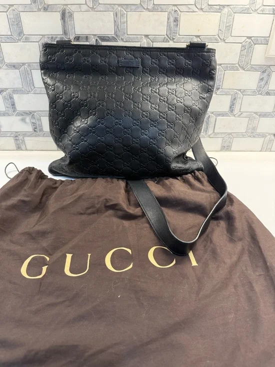 Gucci Black Embossed GG Leather Shoulder Bag with Adjustable Strap - Picture 1 of 10